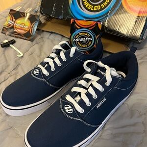 Original Heelys never warn, brand new. men’s size 10